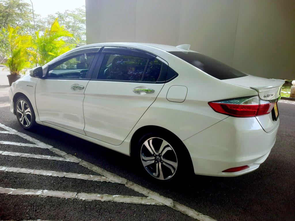 Left side — Honda Grace